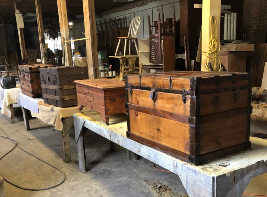 Antique wooden chests restored by The Furniture Shop in Louisiana